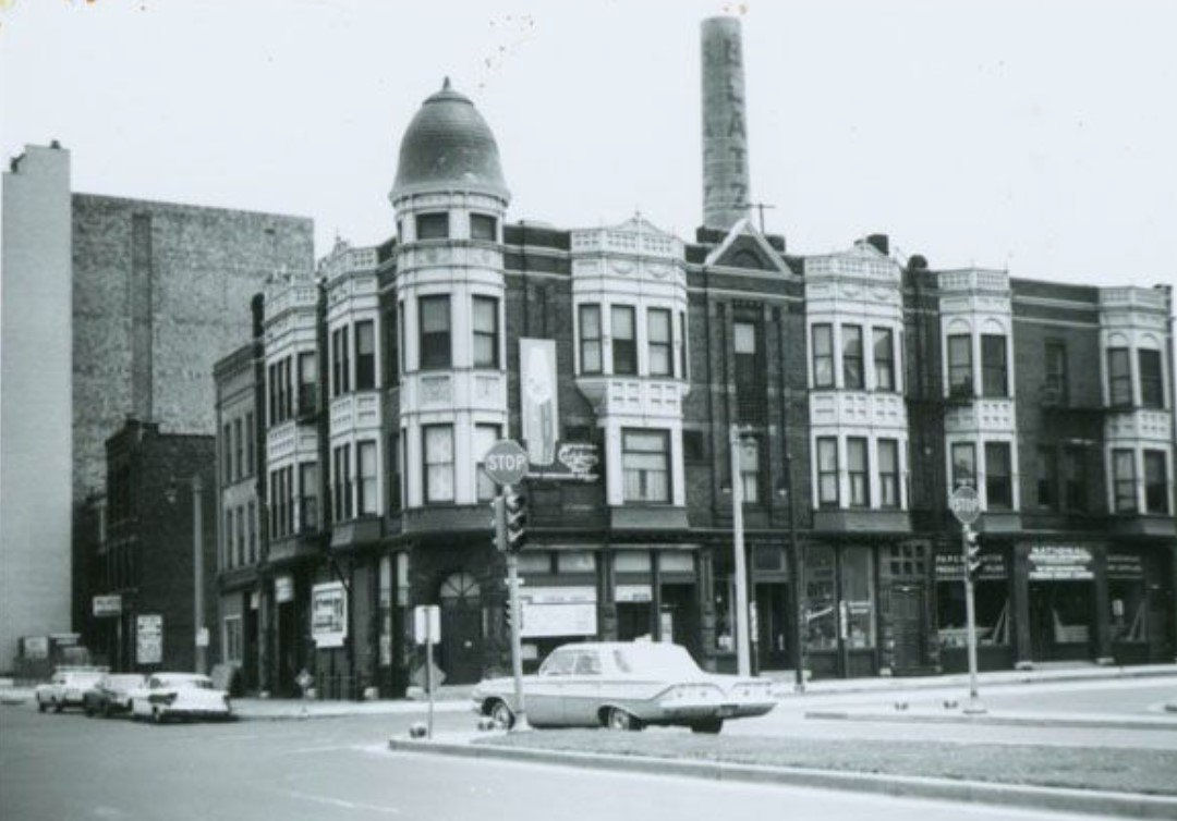 Streetscape showing the building that housed the Bon Ton, at far left.