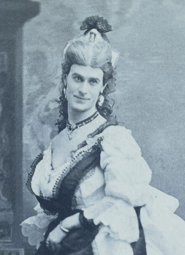 Photo in white dress / (date unknown) / from Harvard Theatre Collection /