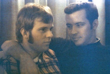 Tom and Gregg at a social party / December 1970